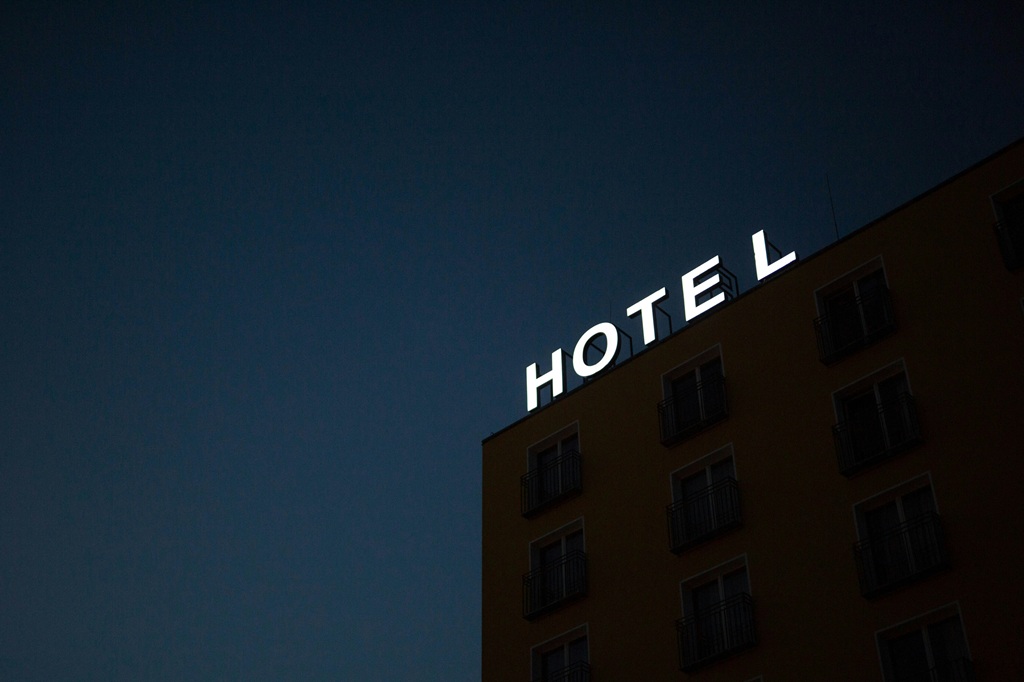 Hotel sign illuminated for card processing article
